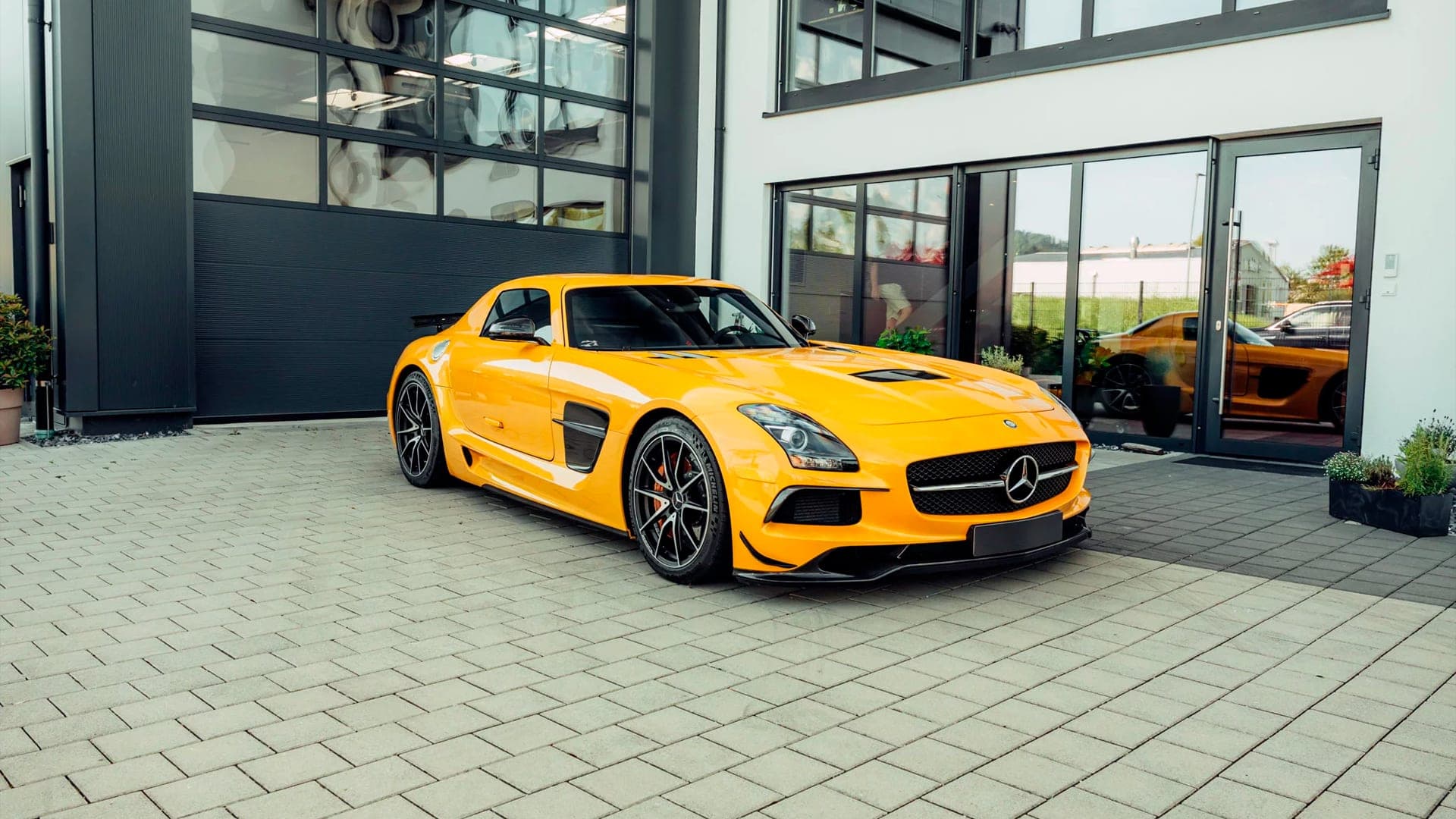 Yellow Mercedes-AMG SLS Black Series front three-quarter view