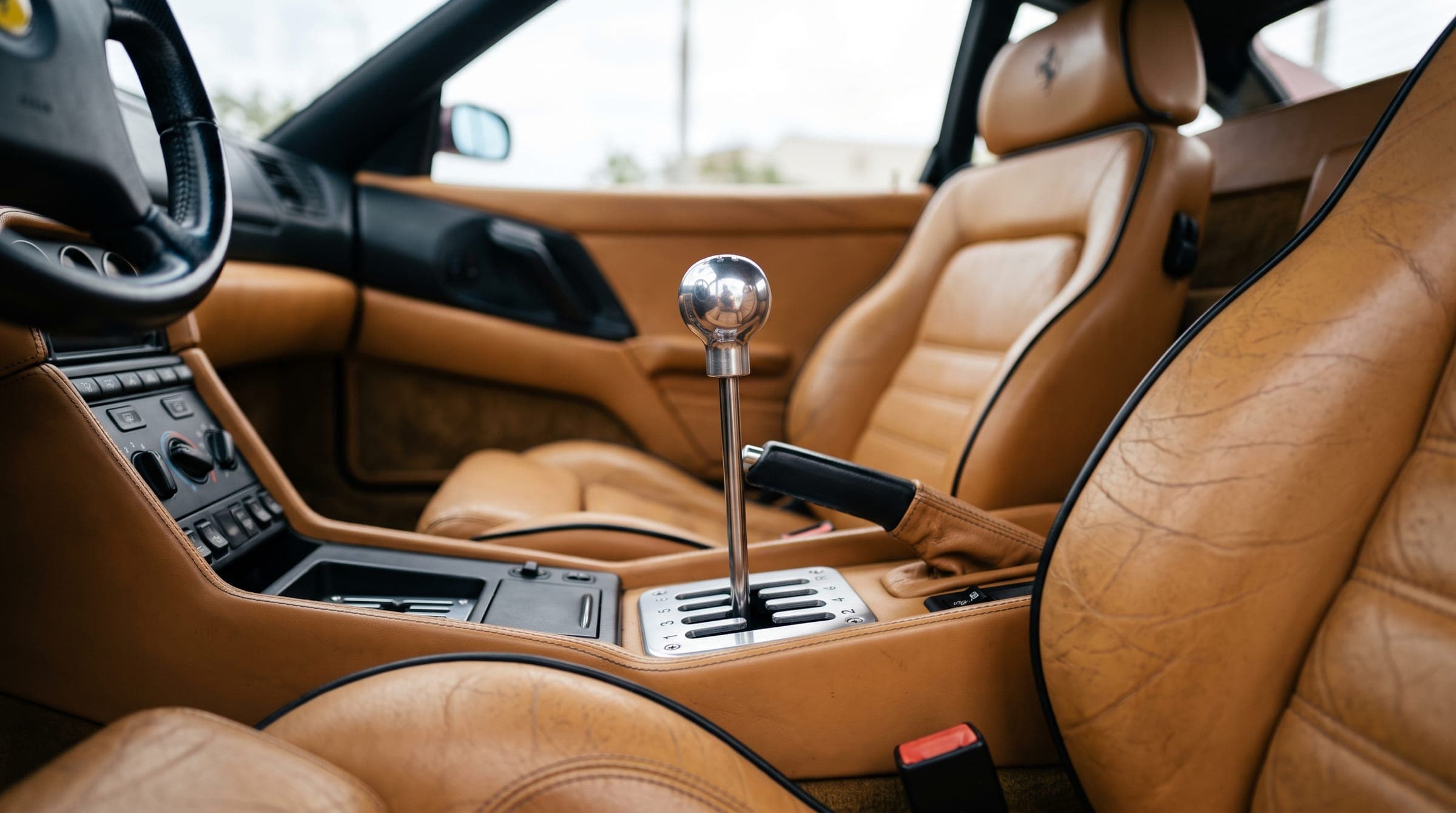 Ferrari F355 gated manual shifter and tan leather interior